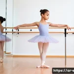 Home 21 아이들 위한 발레 수업 - A young Arab girl in a clean, bright ballet studio wearing a modest pastel-colored leotard and balle...